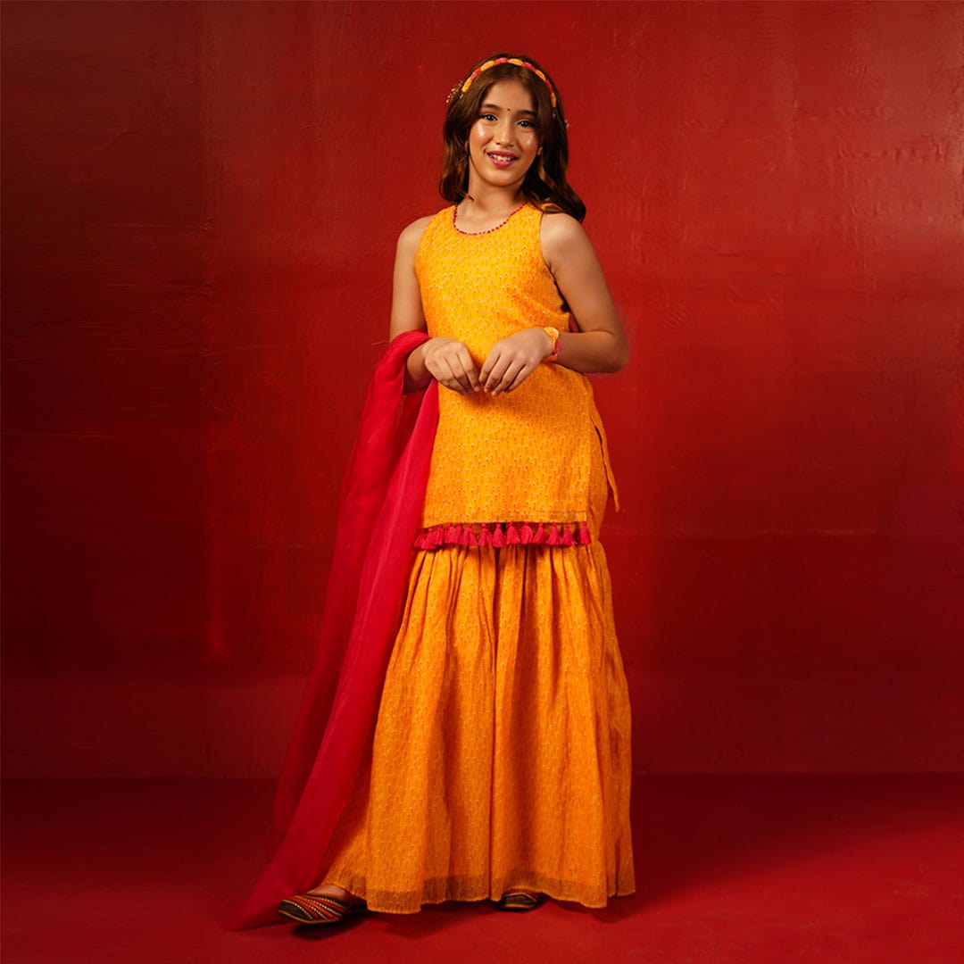 Gulmohar mustard sharara with French knot handwork for girls festive fashion Hyderabad