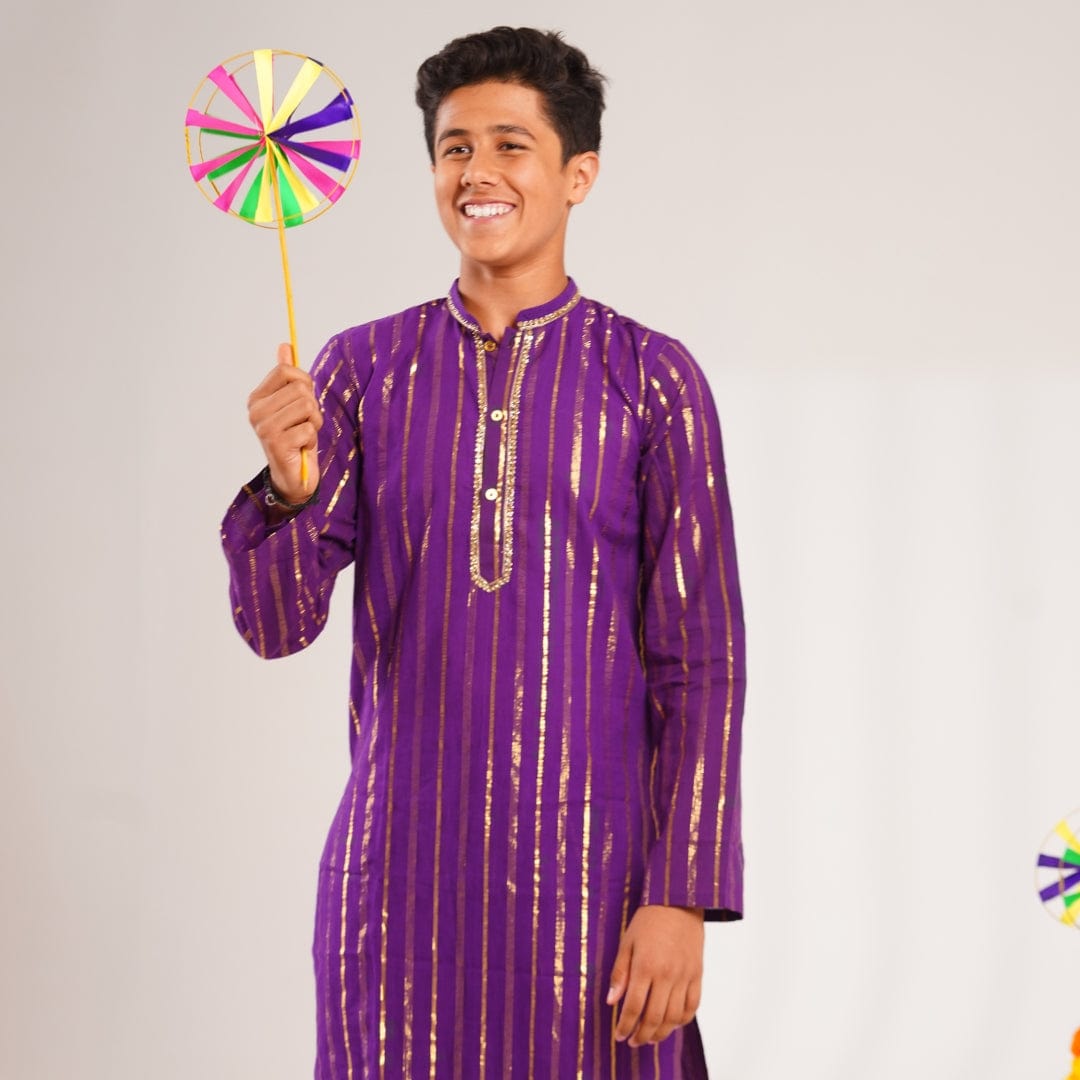 Golden kurta pajama for boys paired with sister's outfit