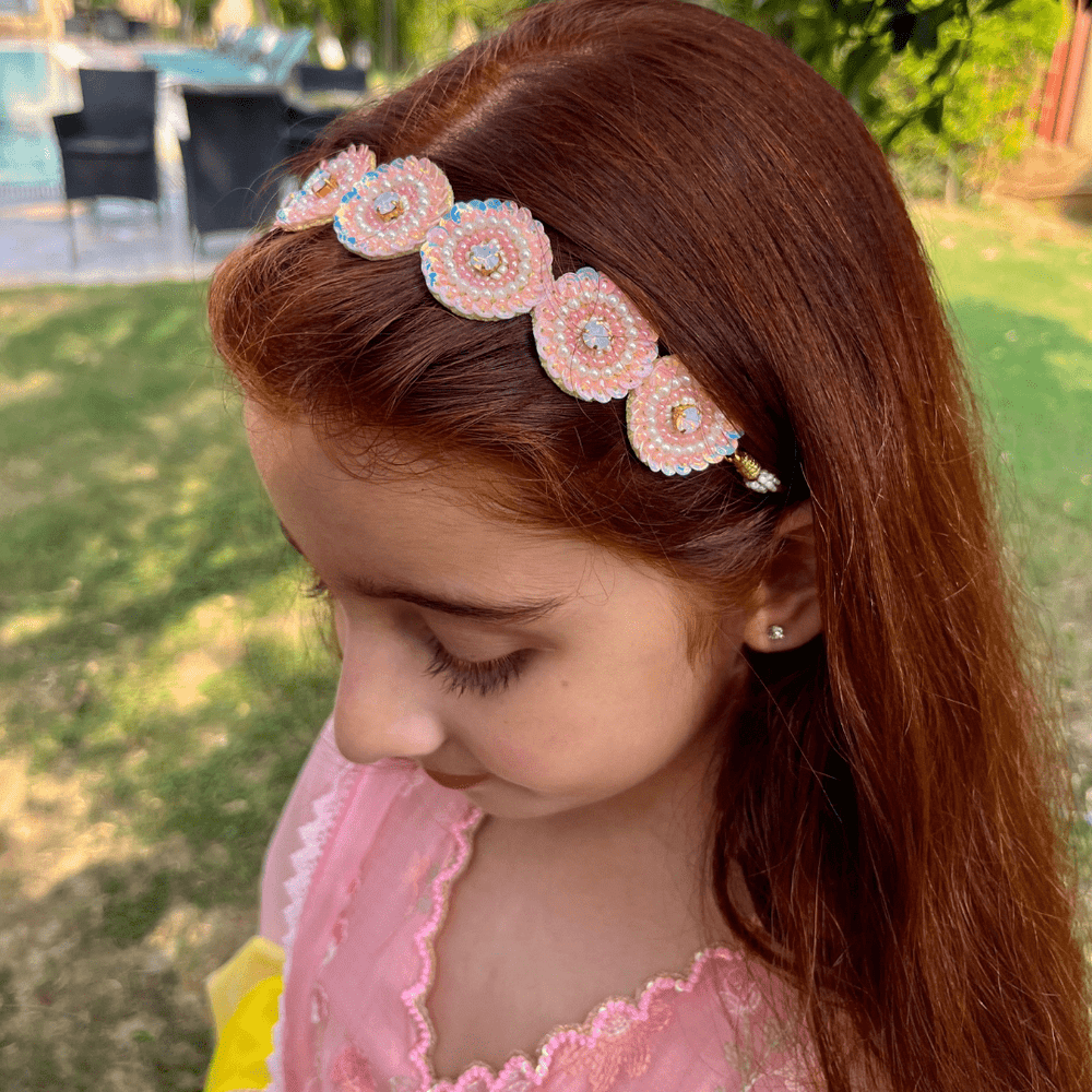 Delicate pink pearl and central stone handmade headpiece, artisan-crafted for sangeet nights in Gurgaon DLF.