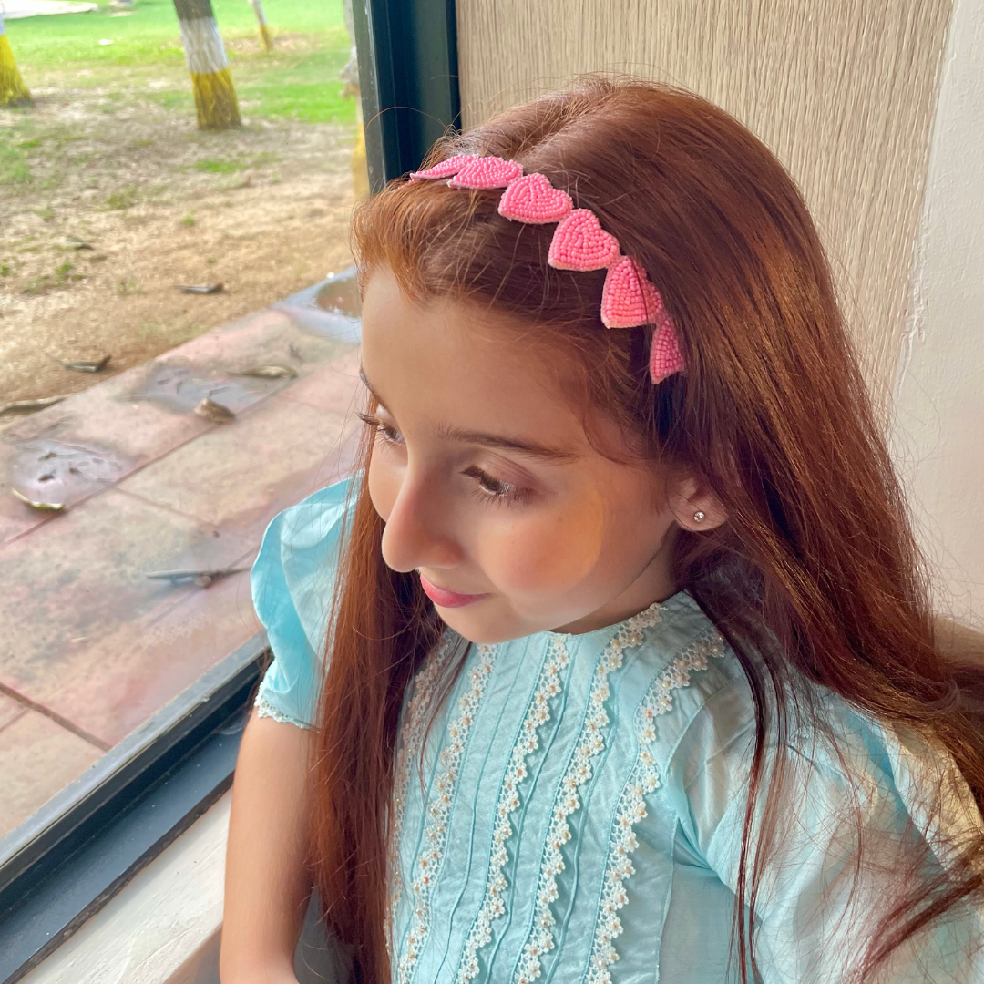 Lightweight baby pink beads headband with heart-shaped detailing, ideal for Navratri nights in Ahmedabad festive wear.