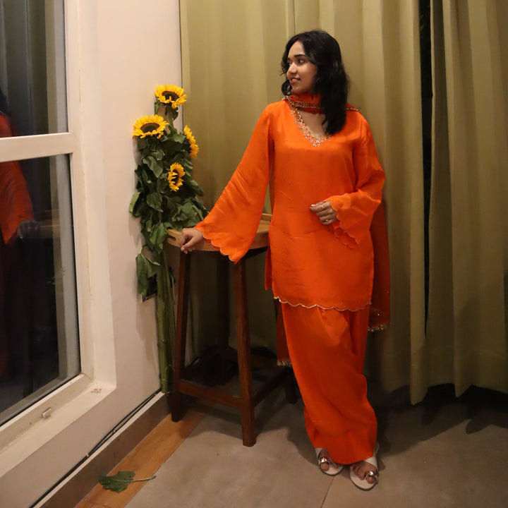 Bright orange Farsi salwar set for girls perfect for Eid celebrations
