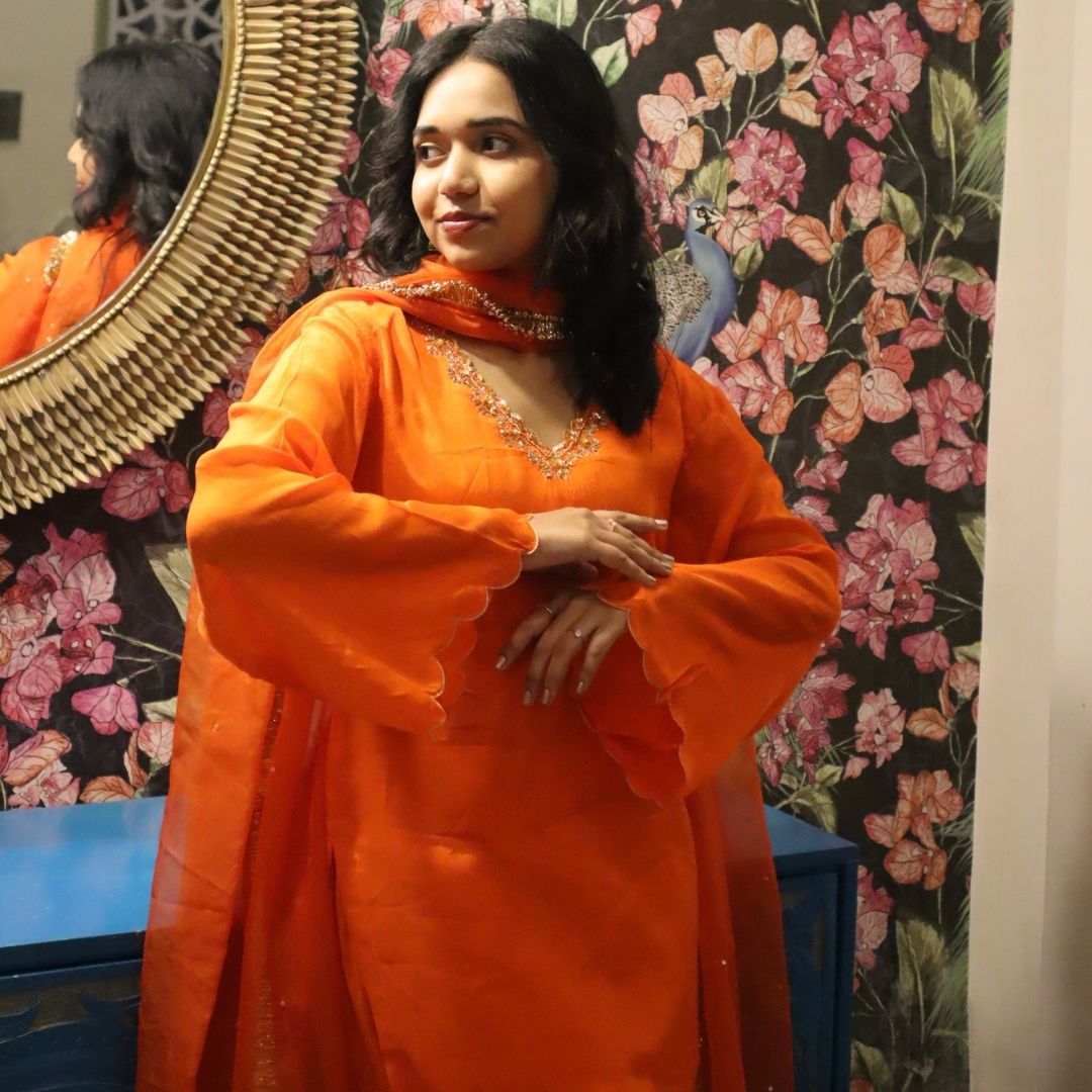 Bright orange flared Farsi salwar with kurta for girls