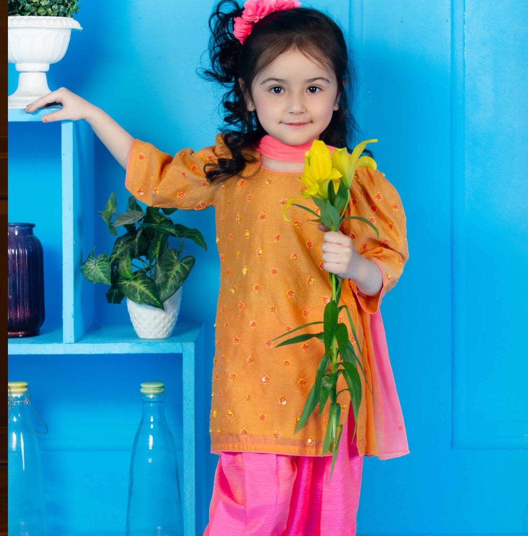 Bright orange suit with fuschia pink salwar for girls for Indian wedding Delhi