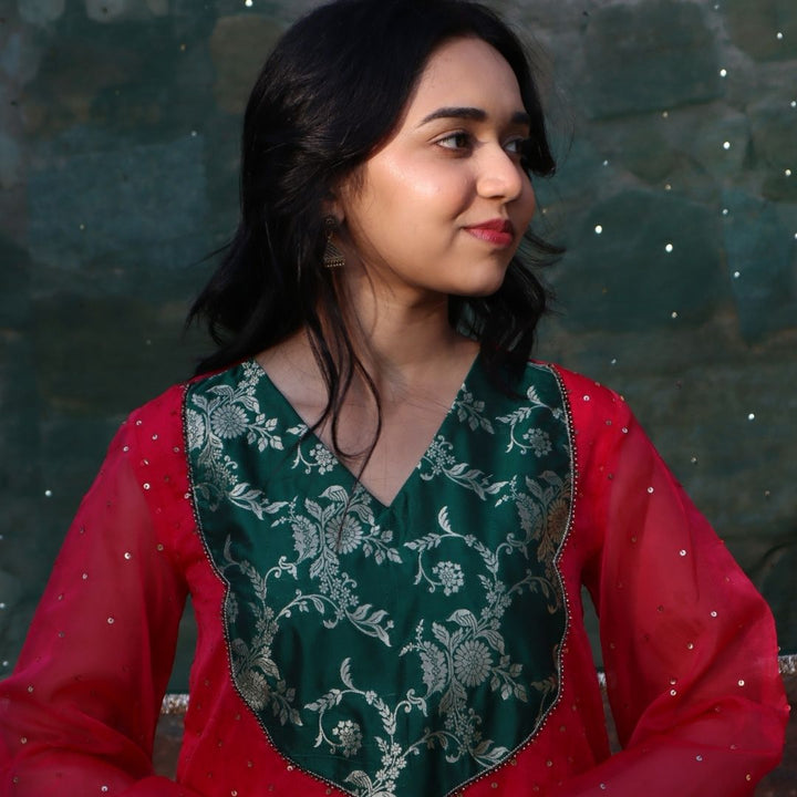 Bright pink and green sharara outfit for Ganpati festival