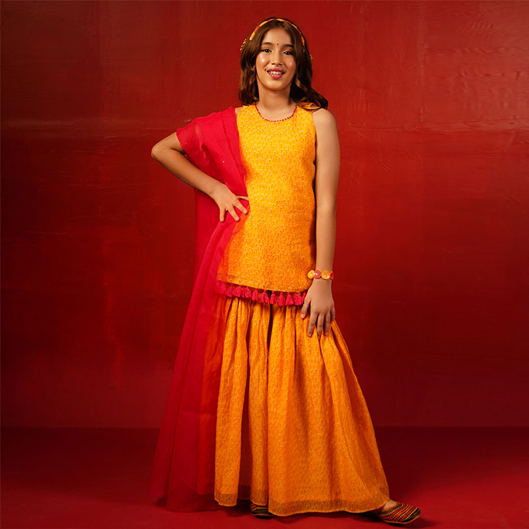 Designer mustard sharara suit with pink accents Navratri ethnic kidswear Chandigarh