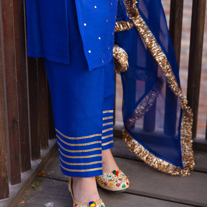 Designer Persian blue and golden ethnic suit for girls for reception in Qatar