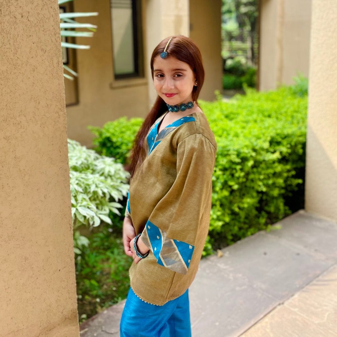 Golden and peacock blue girls ethnic suit for haldi and mehendi celebrations in Mumbai