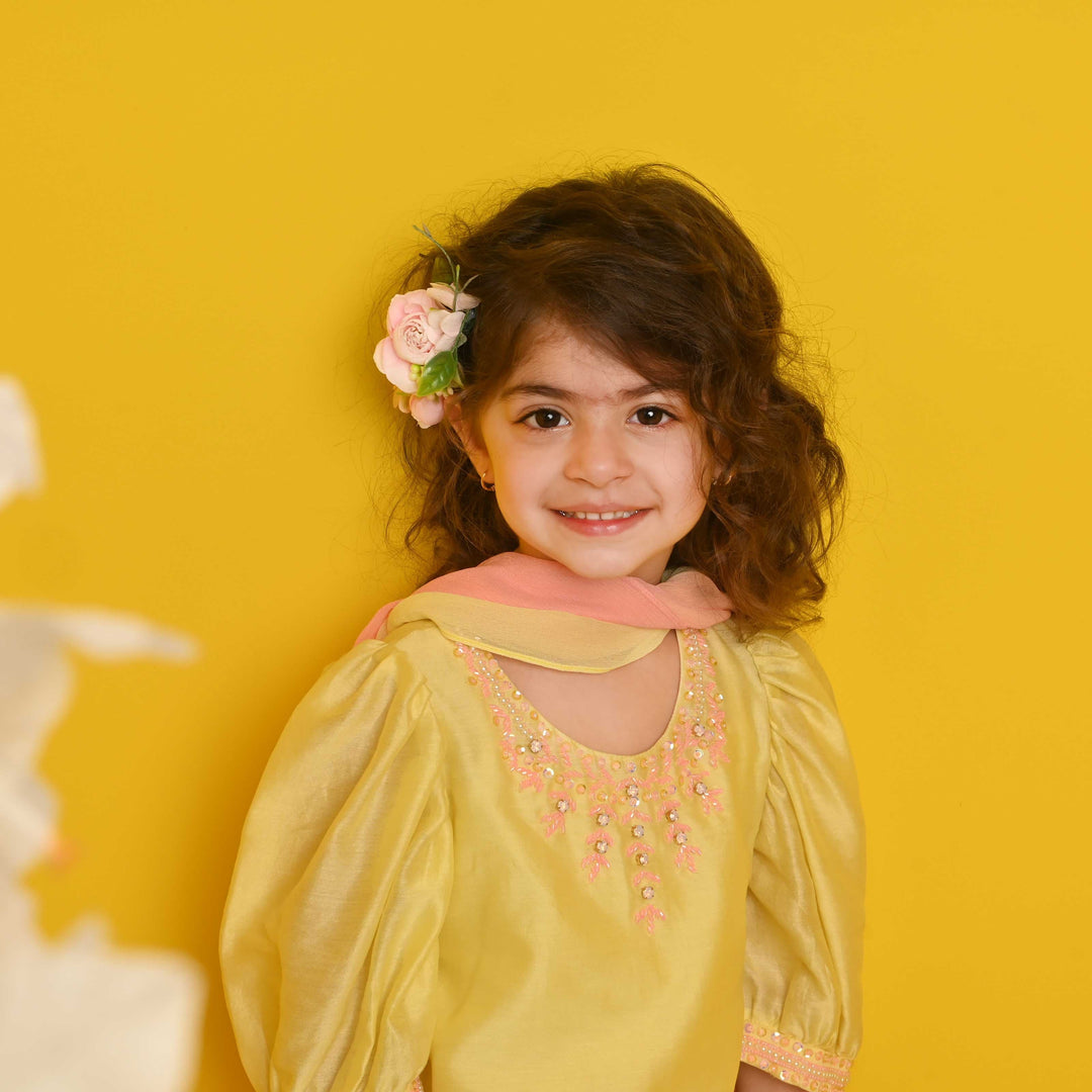 Pastel yellow embroidered suit salwar with pink stone detailing for Eid and wedding in Mumbai