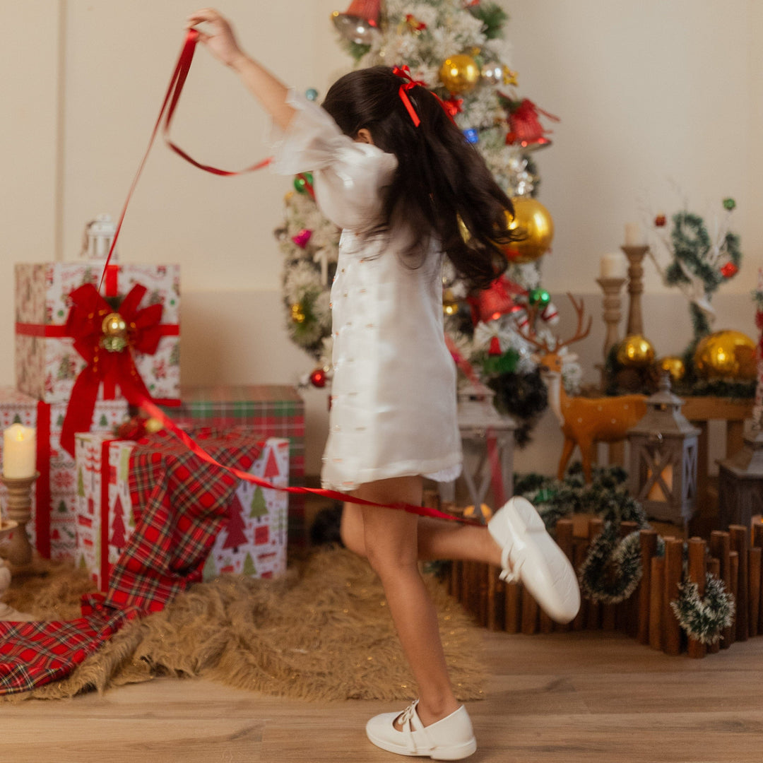 Designer white hand-embroidered tunic for girls in Dubai for Christmas