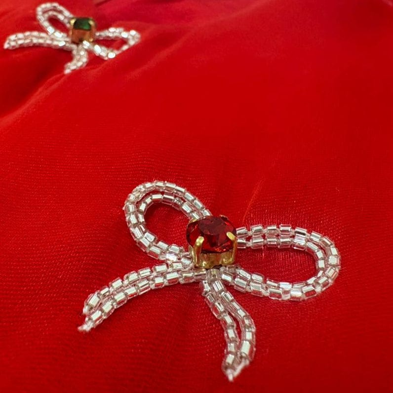 Red christmas frock  with decorative bows and gemstones for girls
