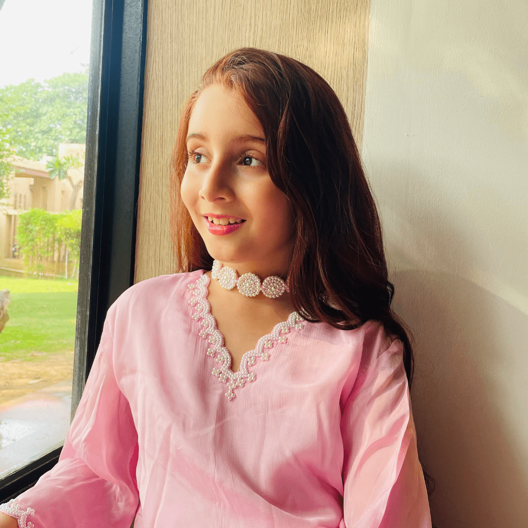 Posh pink pearl choker for girls in Hyderabad, elegant festive accessory for weddings and celebrations.