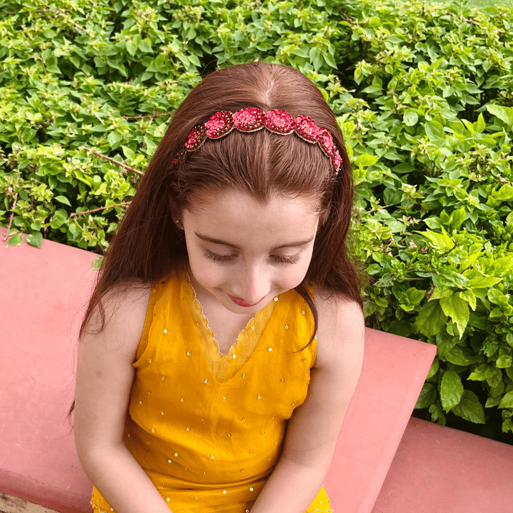 Red sequin embellished head accessory, lightweight and no-itch design for ethnic celebrations.