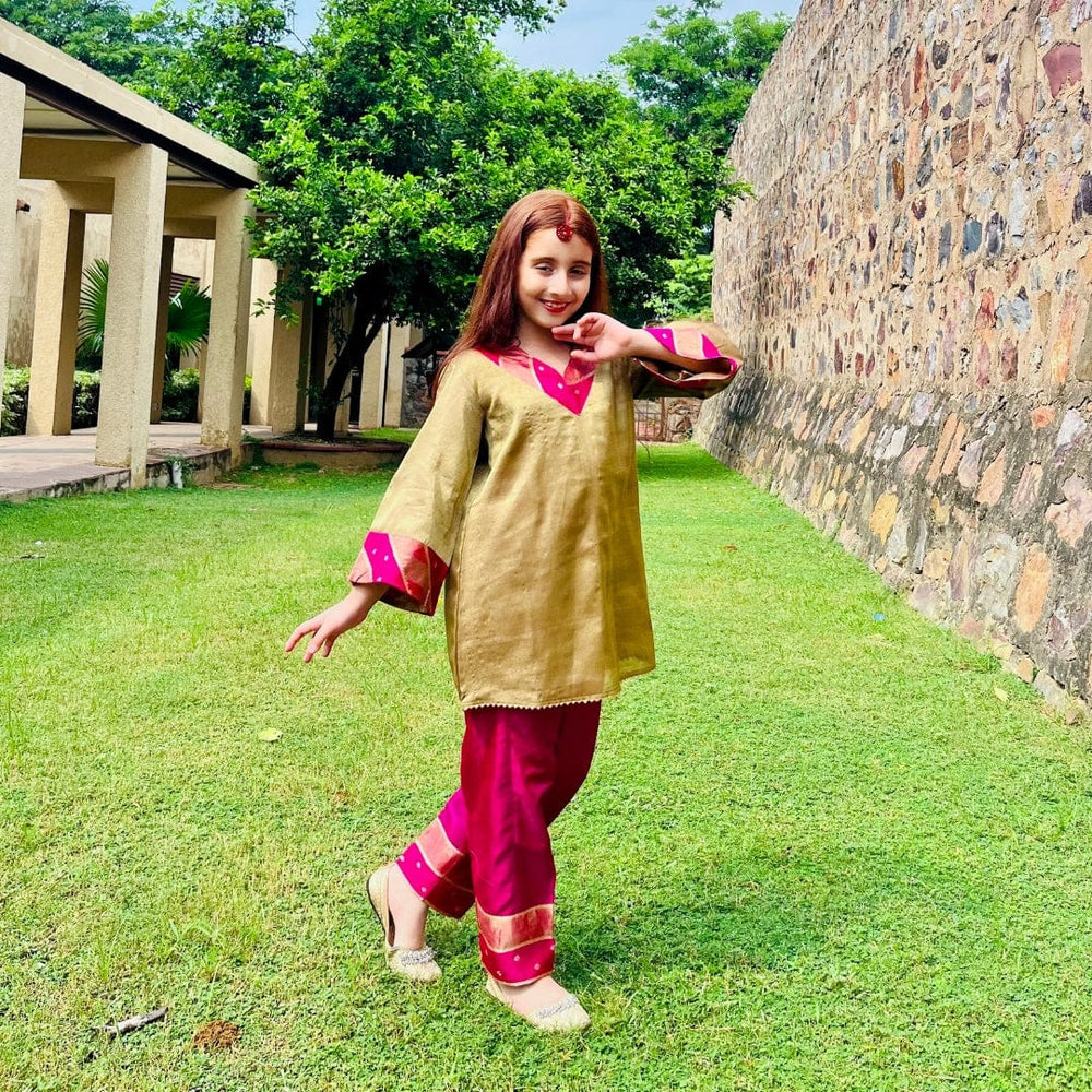 Premium brocade golden suit with pink pants and sheer dupatta for wedding events in Dubai