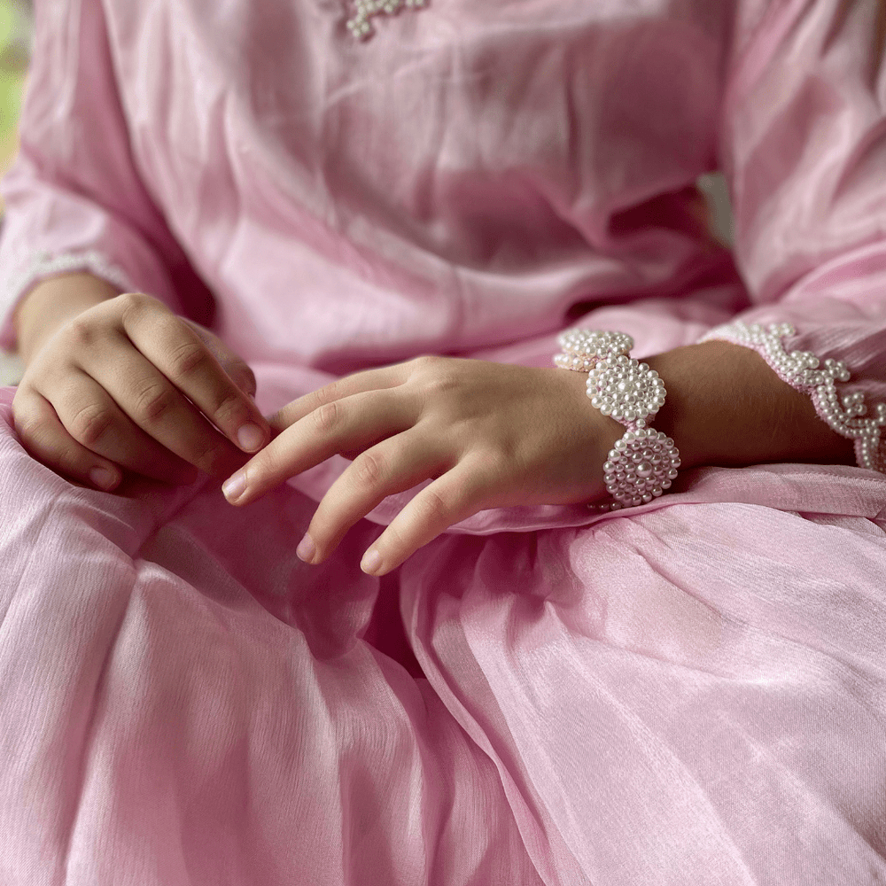 Classic pearl bracelet for girls, designed to match ethnic wear like lehenga, sharara, and suit sets.