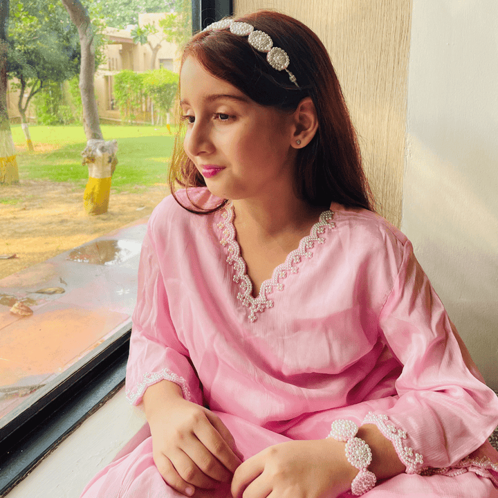 Pearl pink fabric chanderi head accessory, handmade with pearl detailing for Jodhpur festive occasions.