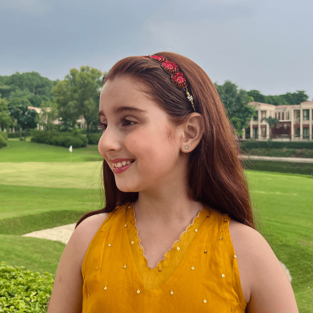 Handmade red sequin head accessory for girls, sparkling festive wear for Diwali and weddings in South Delhi.
