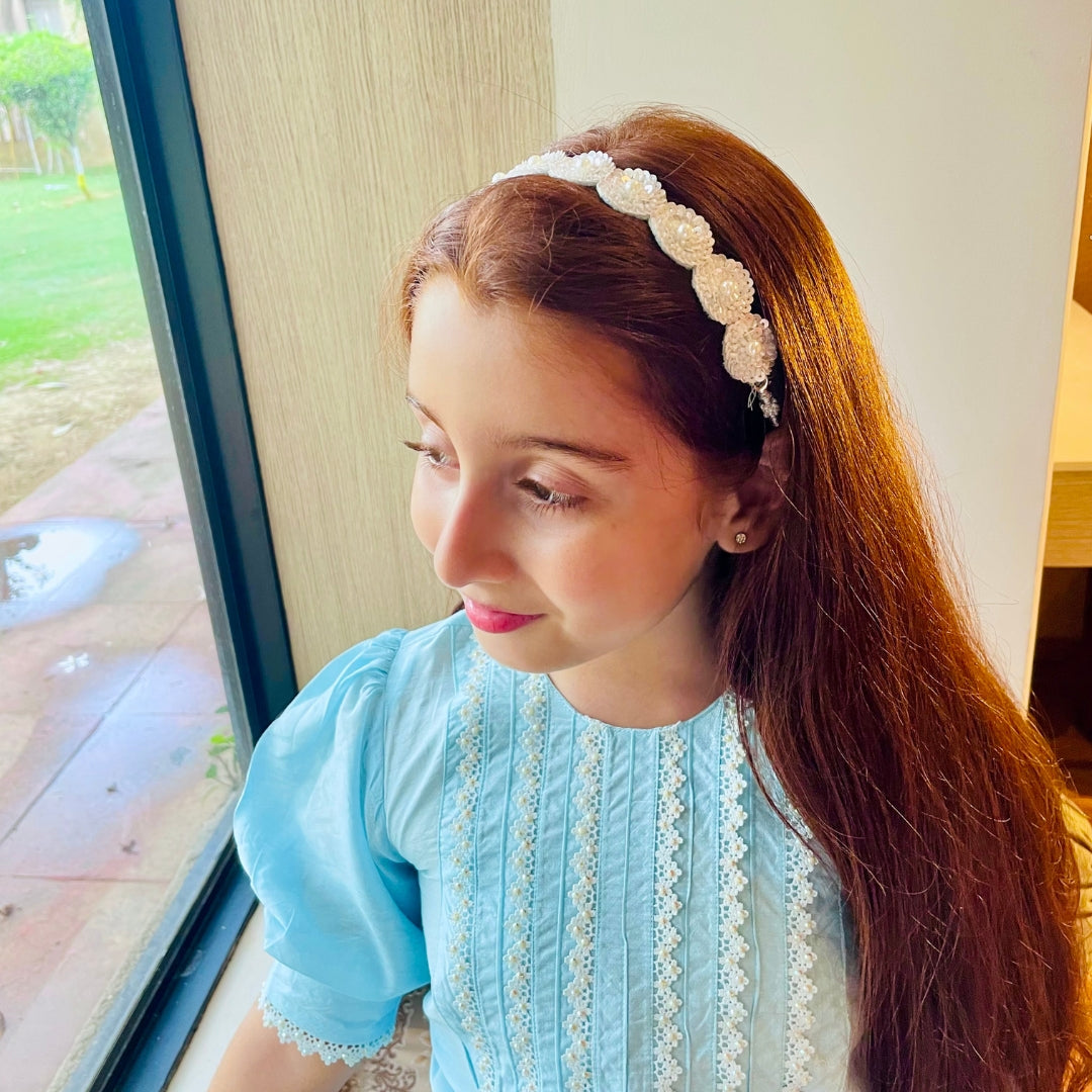 Handmade sky blue sequin headpiece with pearl accents, adjustable for Diwali, Navratri, and wedding events.