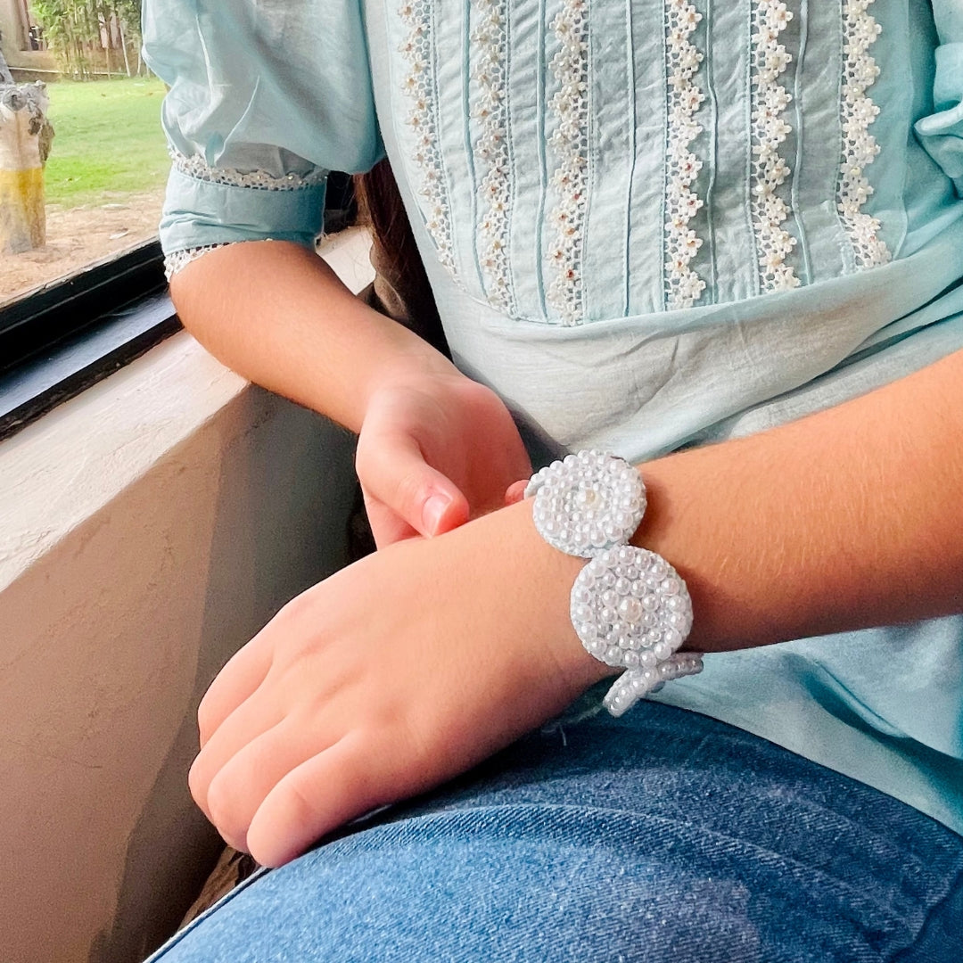 "Ethnic blue white pearl sequin hand bracelet, handmade and soft for all-day comfort, elegant accessory for festive occasions like Diwali, wedding, and haldi – showcased in Jubilee Hills, Telangana."