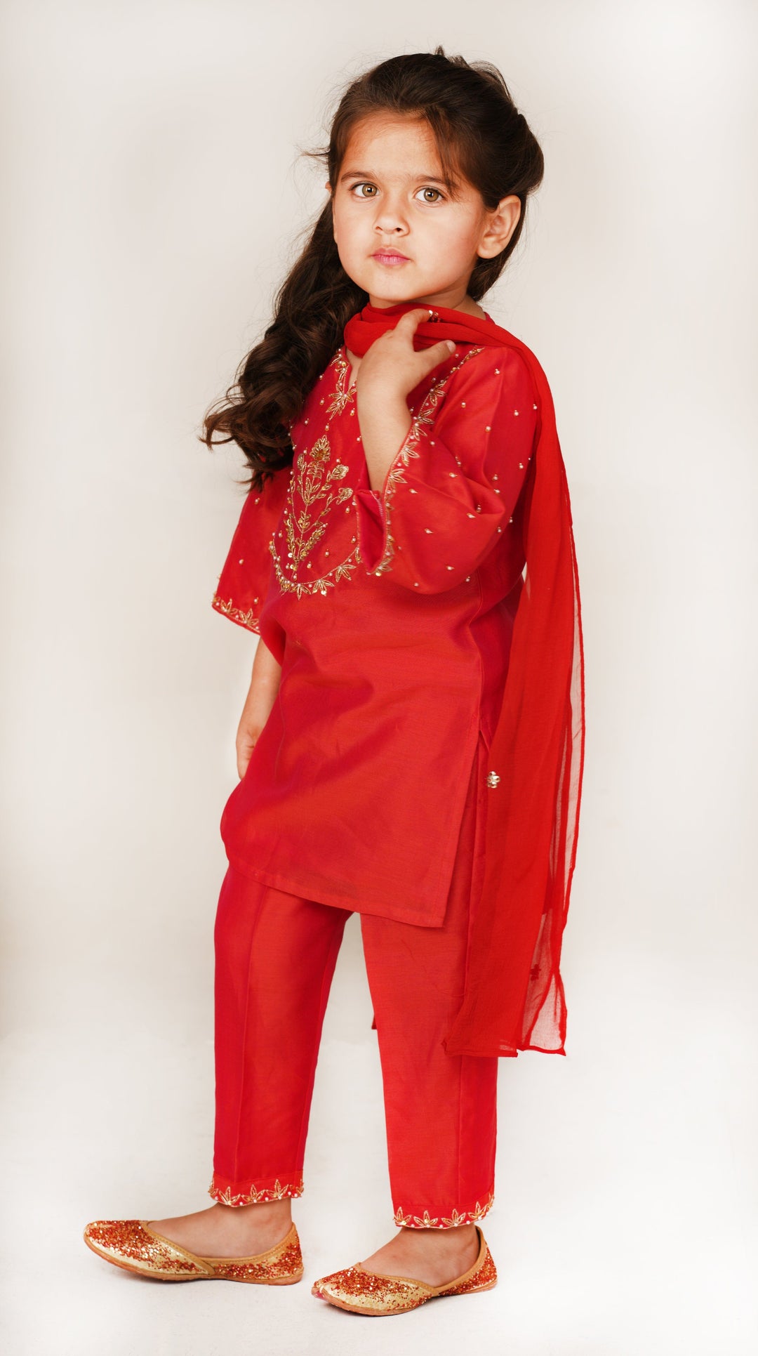 Handcrafted red ethnic wear for girls for Eid and wedding celebrations in Hyderabad