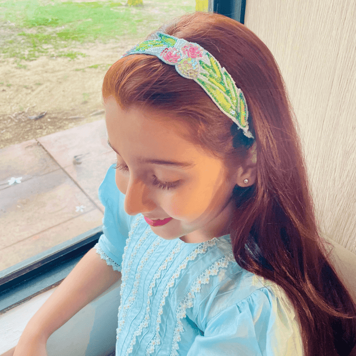 Small pink floral head accessory with multiple shades, multipurpose for ethnic wear and modern dresses.