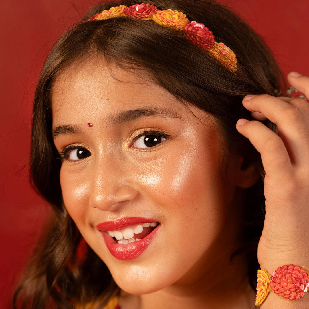 “Elegant ethnic bracelet featuring soft petal-inspired embellishments, ideal for traditional outfits and long celebrations.”