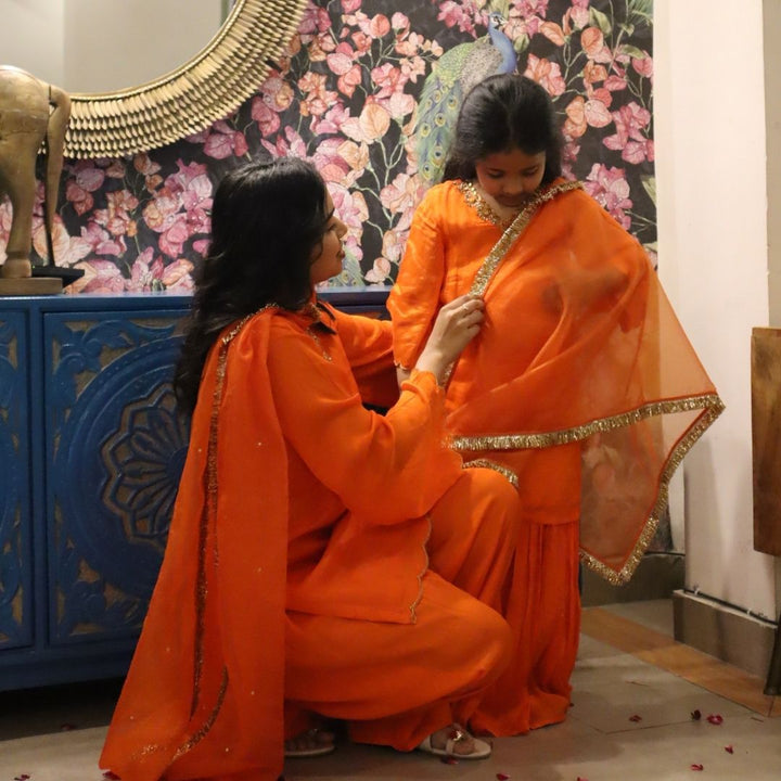 Lightweight orange Farsi salwar set for festive occasions