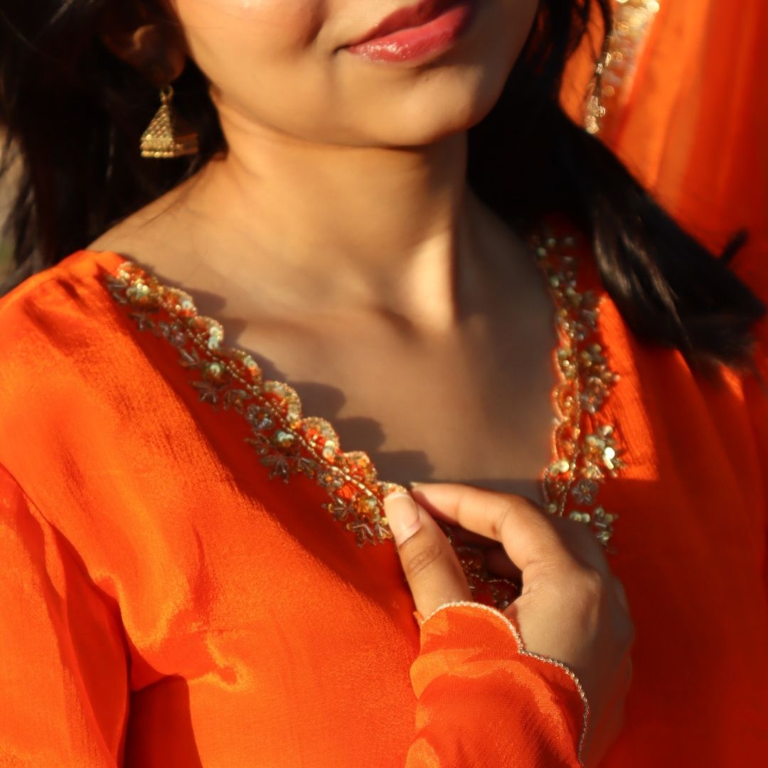 Luxury bright orange Farsi salwar set in South Delhi