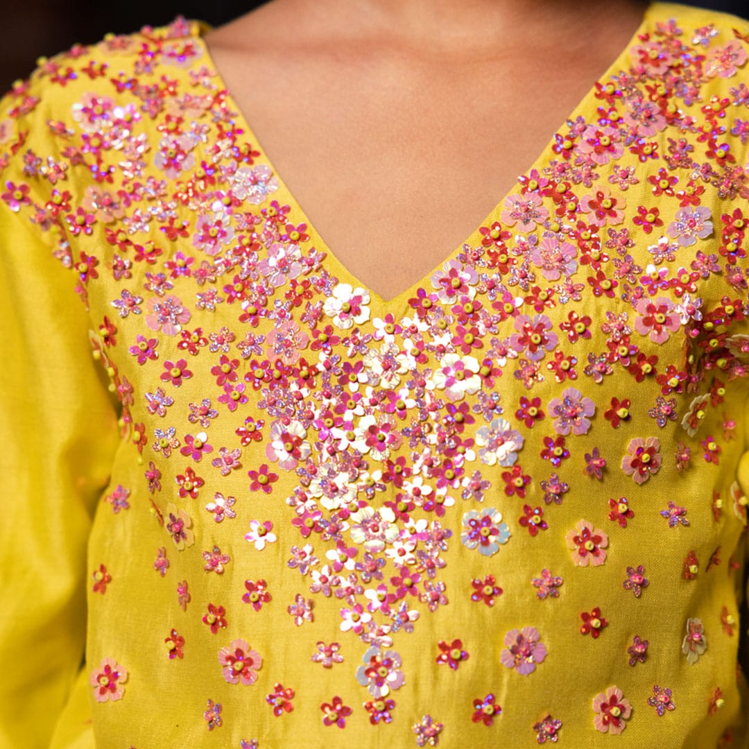 Luxury handcrafted yellow flower suit for girls for festive occasions in Dubai