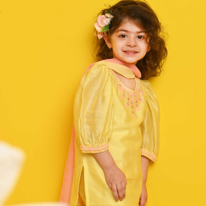 Hand-embellished pastel yellow suit salwar for girls for wedding in posh South Delhi
