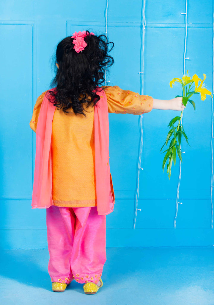 Luxury orange suit with fuschia pink salwar for girls for Hyderabad weddings