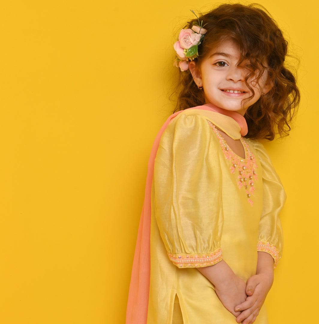 Handcrafted pastel yellow suit salwar for wedding celebrations in Singapore and India