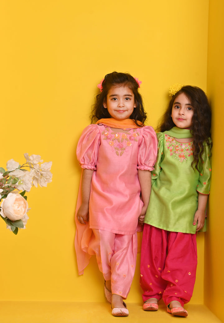 Peach ethnic outfit with embellished bootis for girls for Indian wedding in Singapore