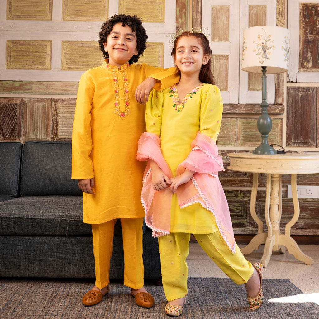 Designer yellow suit salwar for girls with floral embroidery for wedding in South Delhi