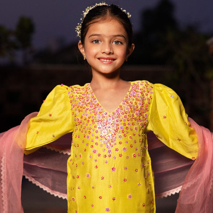Luxury yellow flower ethnic wear for girls for haldi events in Mumbai