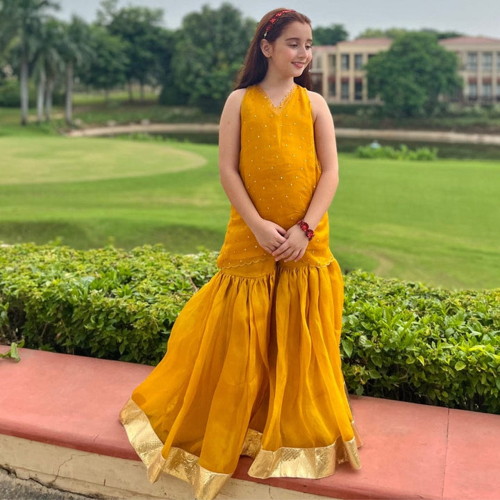 Luxury yellow sharara set for girls – elegant wedding outfit for celebrations in Delhi and Mumbai.