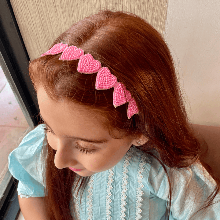 Girls ethnic baby pink beads headband, versatile accessory for Jodhpur Ratanada wedding celebrations.