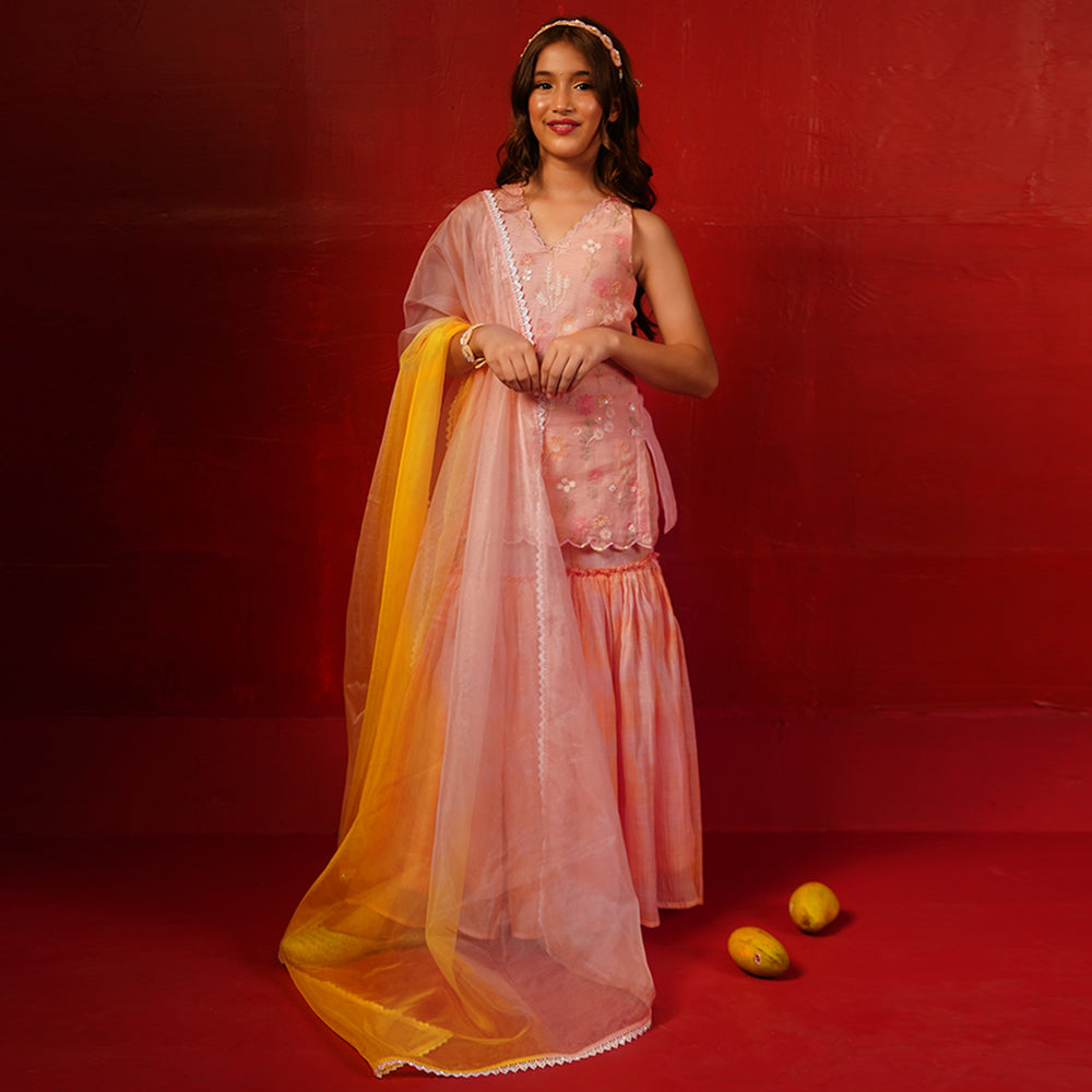 Luxury peach kurti sharara outfit for Diwali pooja celebrations in Mumbai