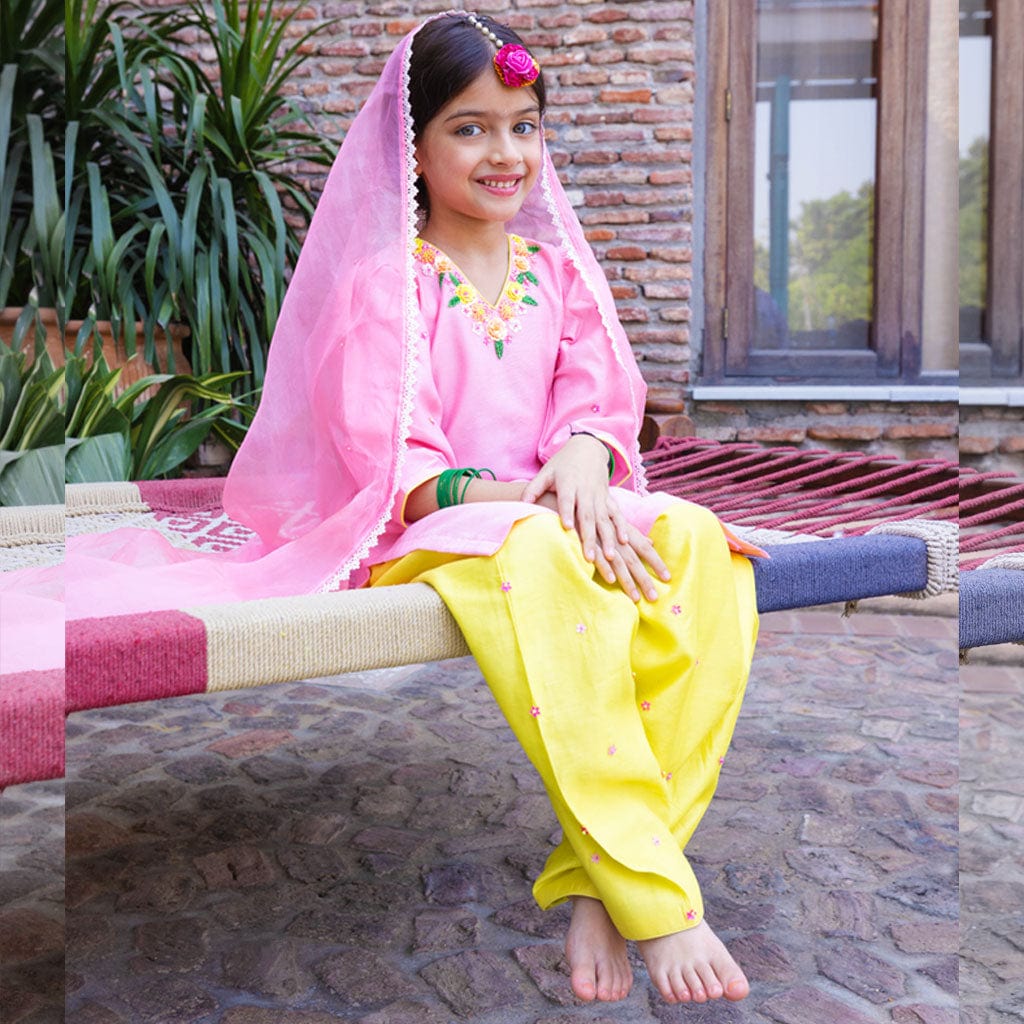 Luxury peach ethnic wear for girls with organza salwar and handmade details for haldi in UAE