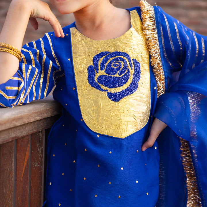 Designer Persian blue and golden ethnic suit for girls for reception in Qatar