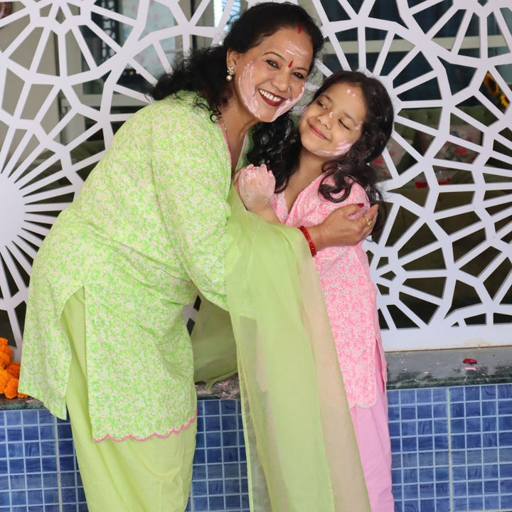 Pink floral printed farshi salwar set for Rakhi celebration in Singapore