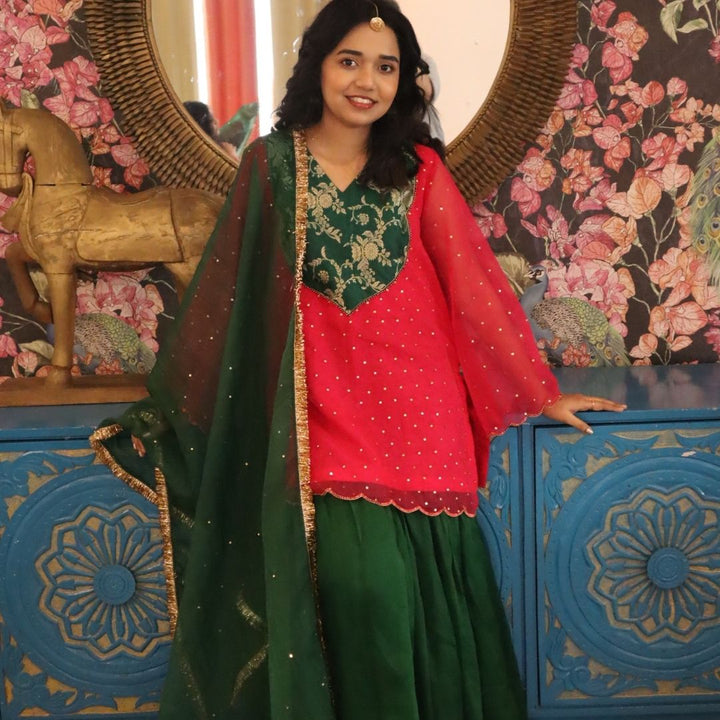 Pink organza kurta with green sharara mother daughter twinning set for Hyderabad wedding
