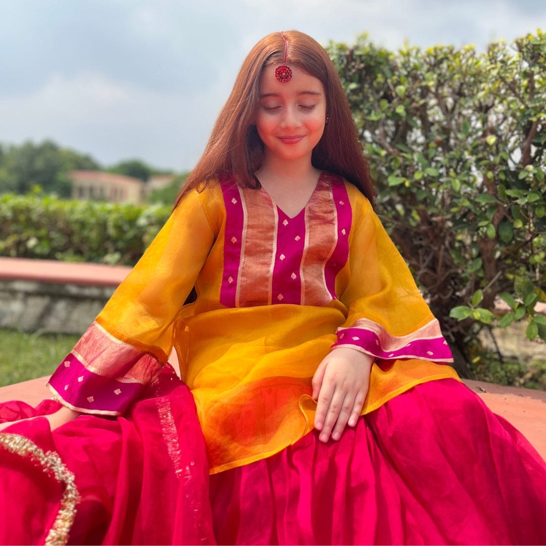 Mustard yellow and pink ethnic wear for girls for wedding brunch in Singapore