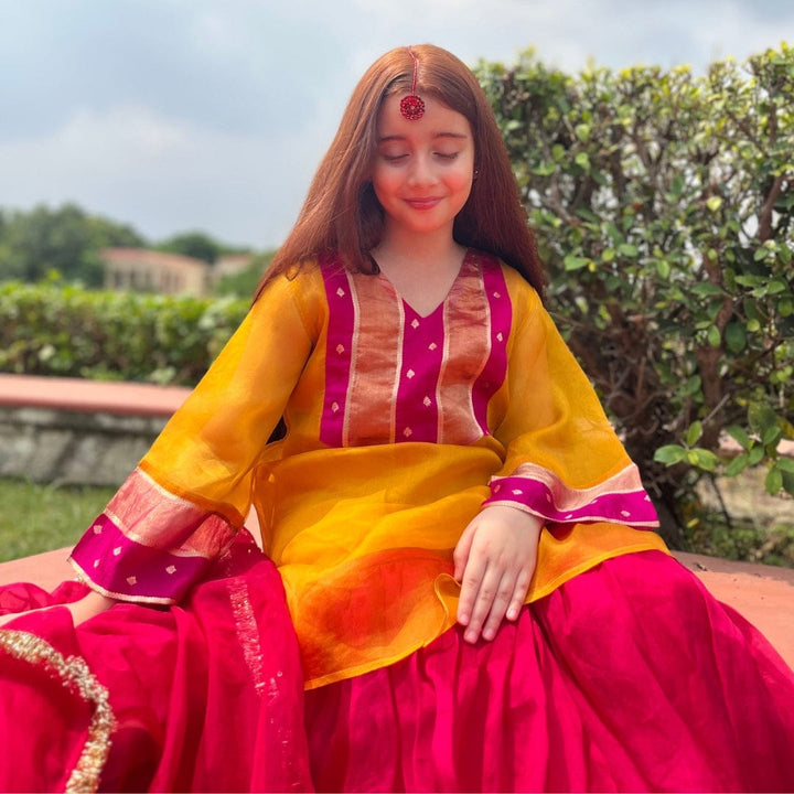 Mustard yellow and pink ethnic wear for girls for wedding brunch in Singapore