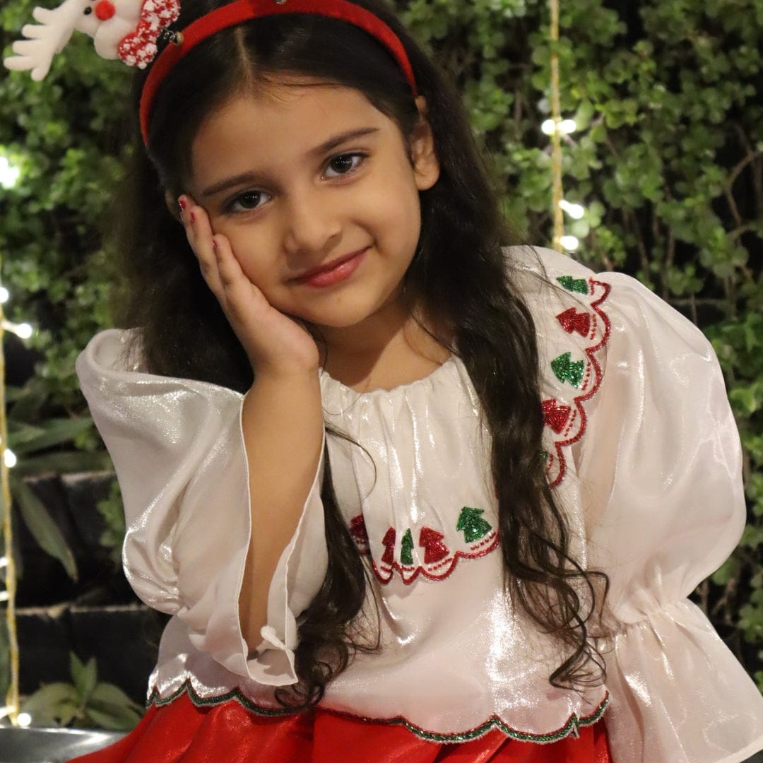 White hand-embroidered top for girls for Christmas celebrations in South Delhi