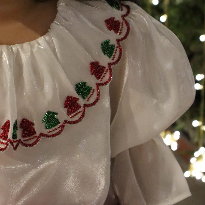 White hand-embroidered top for girls for holiday celebrations in Mumbai