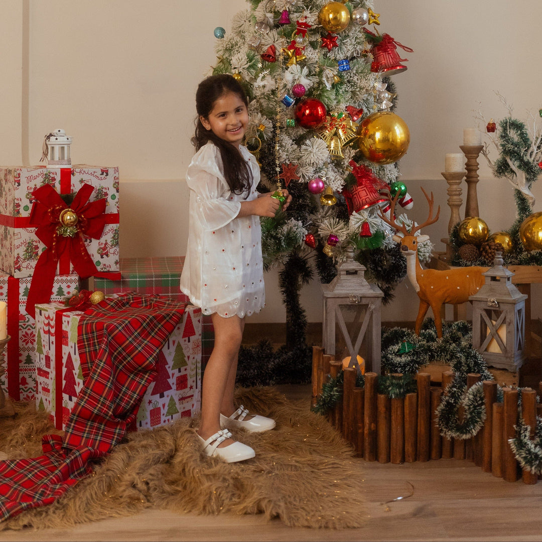White hand-embroidered tunic for girls for Christmas events in Hyderabad