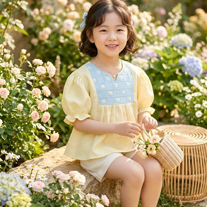 Girls yellow embroidered top for travel and holiday wear