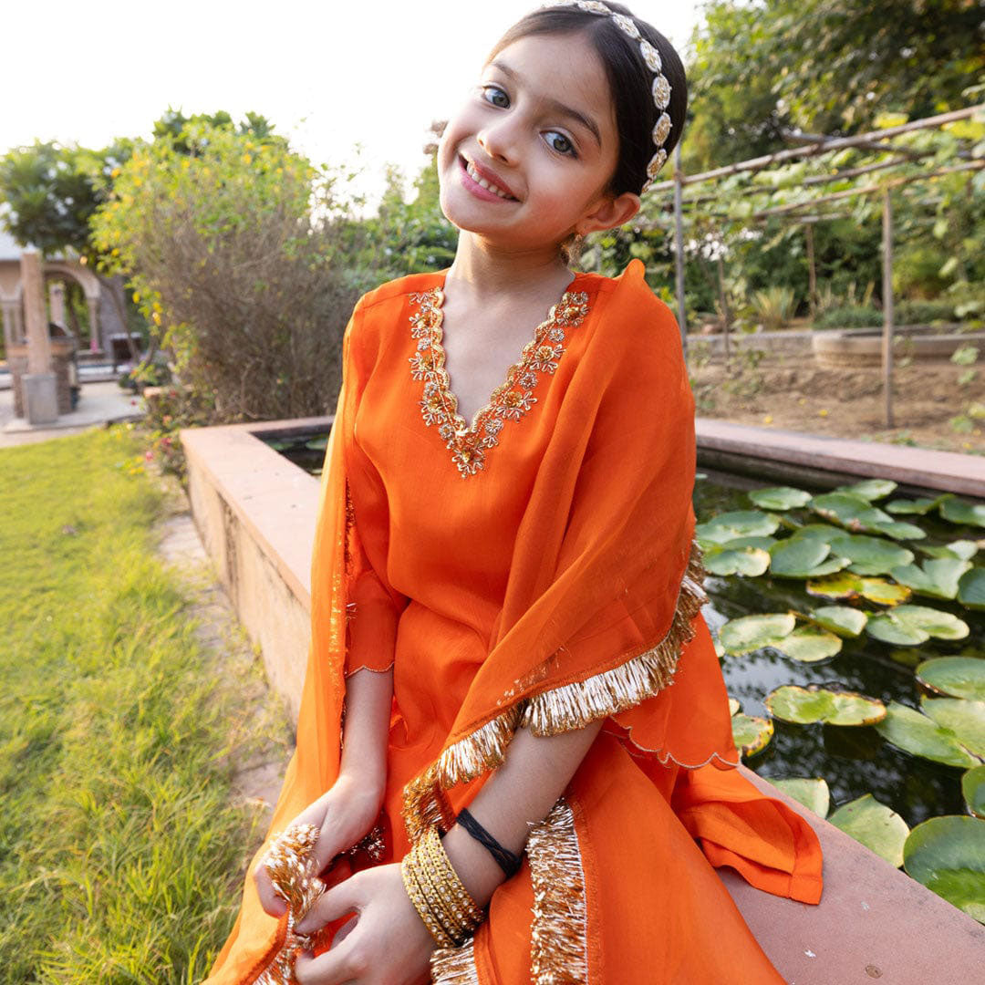 Marigold bright orange sharara movement shot – premium ethnic kidswear ages 1-12 for Navratri pooja, Kolkata Alipore
