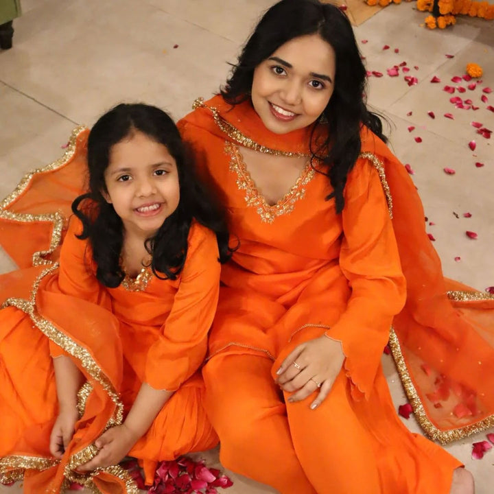 Marigold orange sharara embellished neckline close-up – premium kidswear ages 5-14 for family weddings, Hyderabad Jubilee Hills